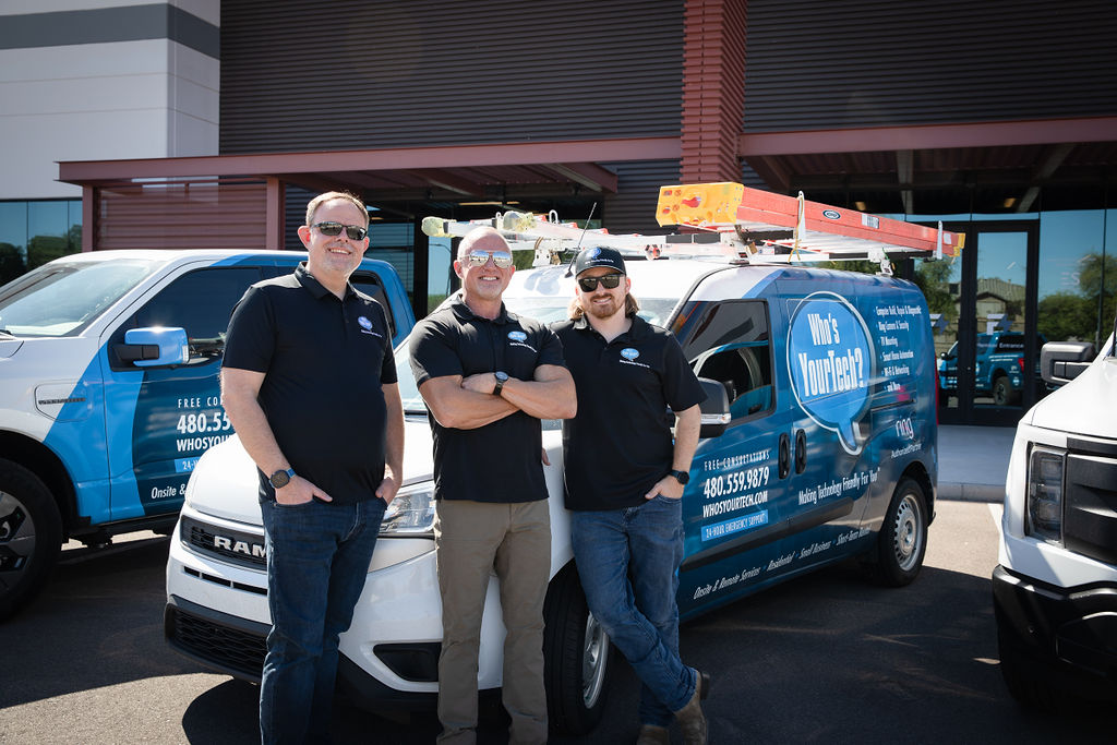 who's your tech and the smart security experts standing in front of the vans